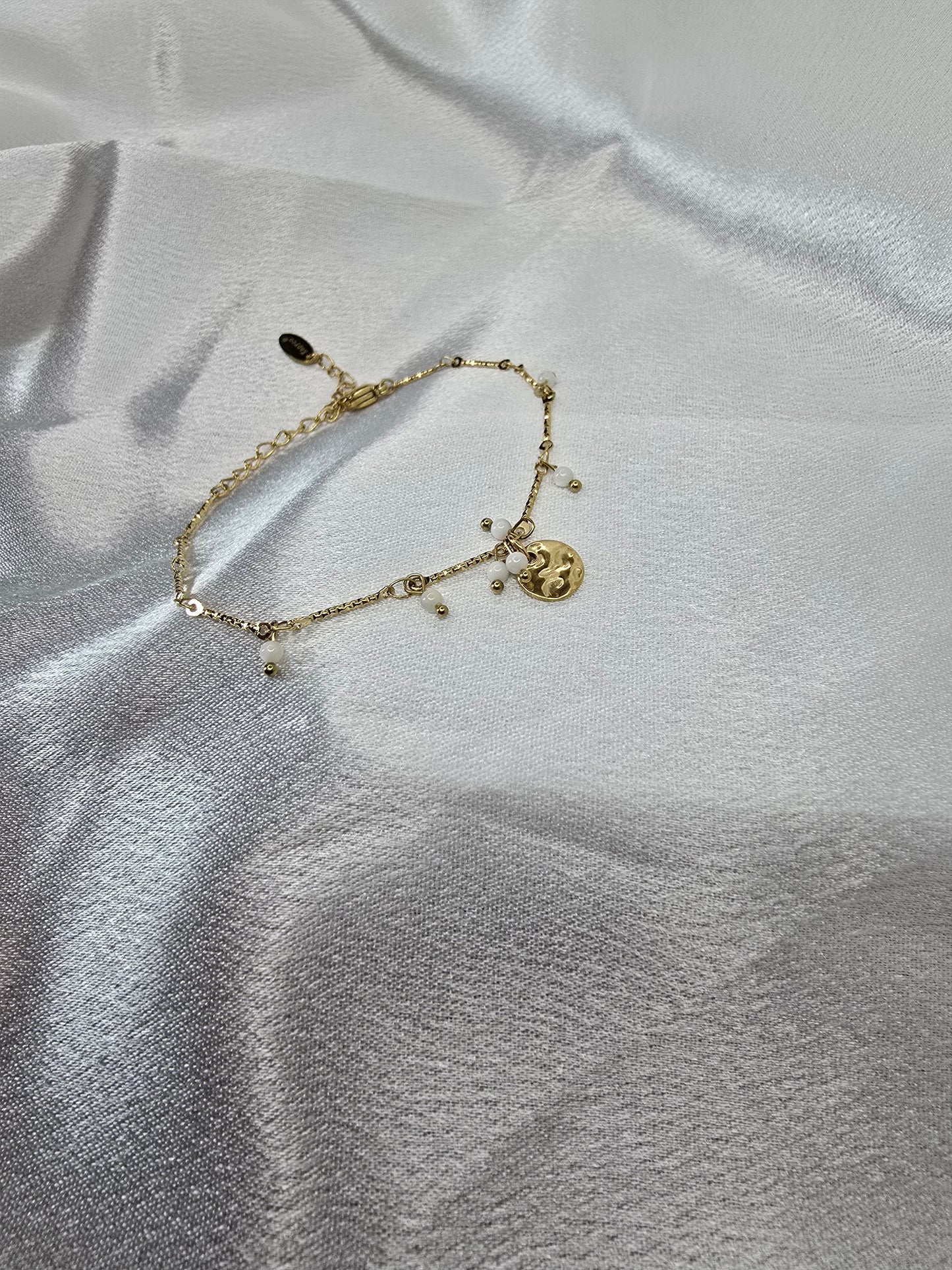 Bracelet pampille nacre en acier doré