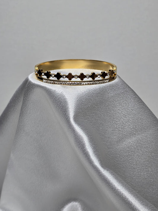 Bracelet jonc doré avec détails croix