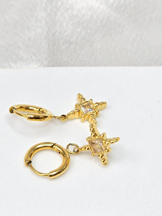 Boucles d'oreilles créoles avec étoiles à strasses