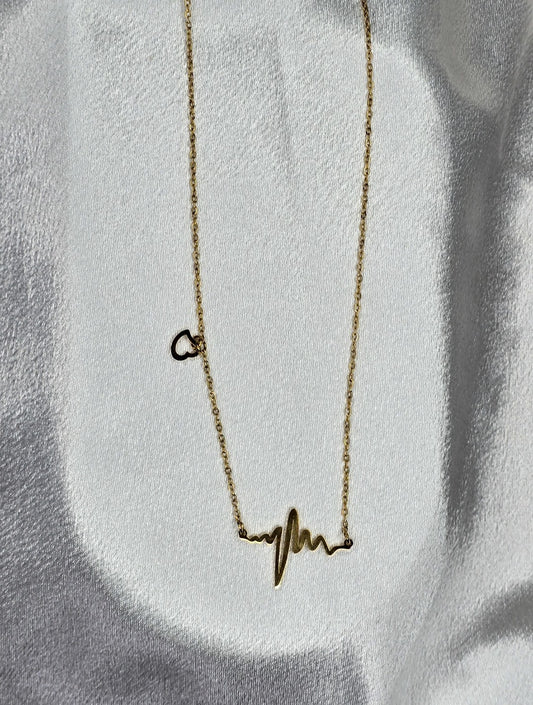 Pendentif électrocardiogramme avec un petit coeur