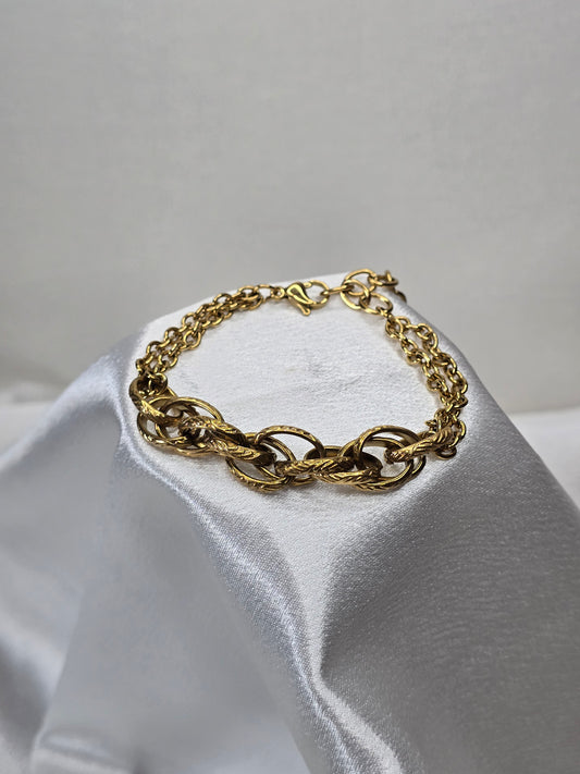 Bracelet doré large maillons lisses et tressés double couches